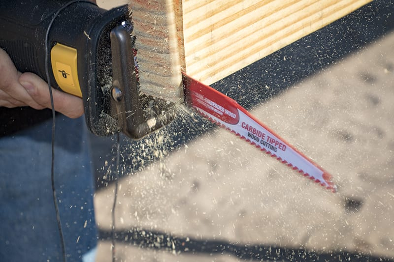 A brushed reciprocating saw in action